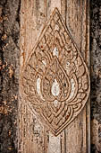 Vientiane, Laos - Wat Si Saket, detail of the decorations of the sim. 